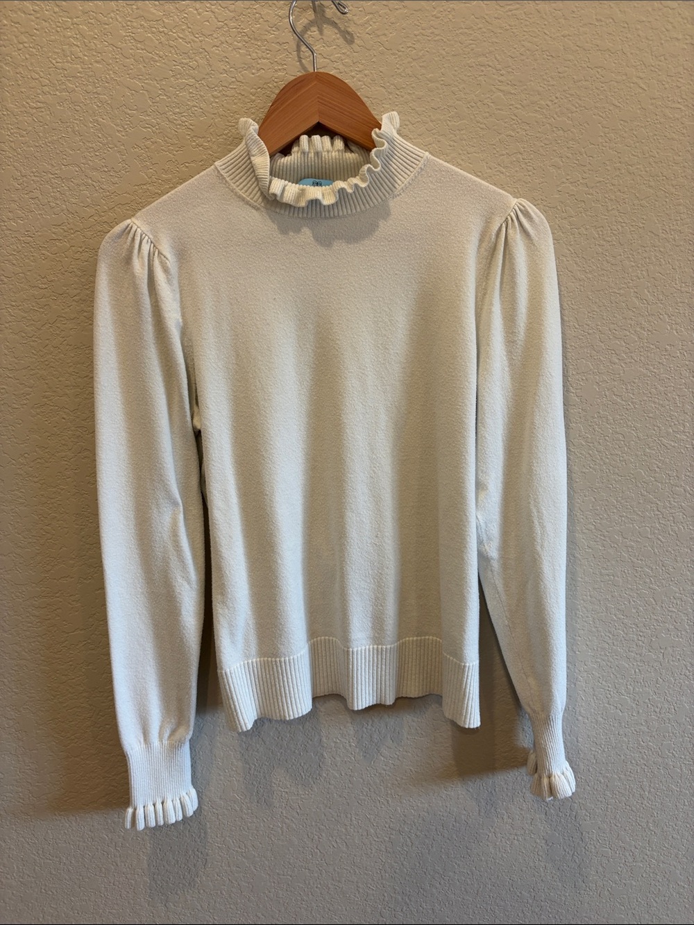 CeCe Cream Ruffle Mock Neck Sweater